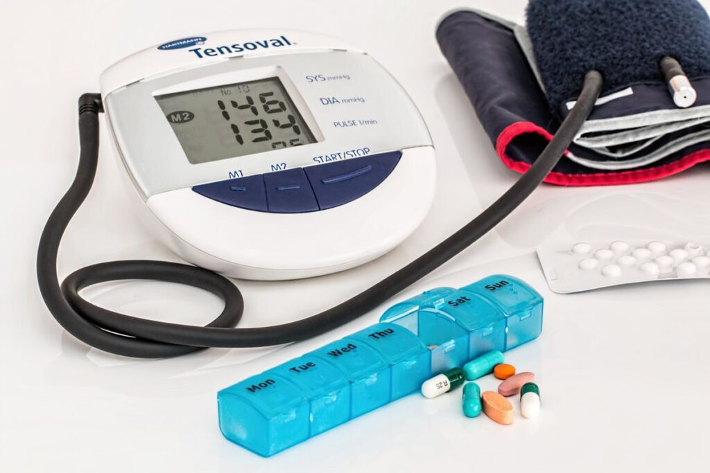 Blood pressure monitor and weekly medication organizer